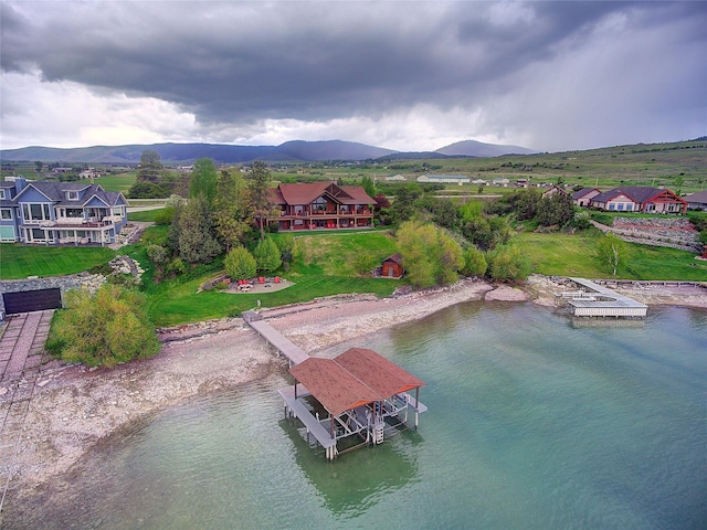 34520 Rocky Point Rd, Polson, MT 59860 - drone / aerial view of a water and mountain view