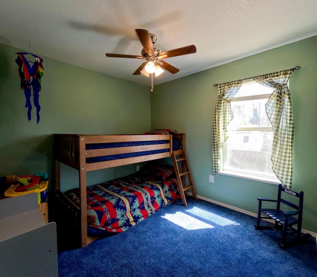 35881 Warbler Dr, Ronan, MT 59864 - bedroom with carpet flooring, baseboards, and a ceiling fan