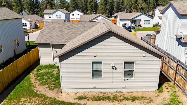 35881 Warbler Dr, Ronan, MT 59864 - rear view of house featuring a residential view and a fenced backyard