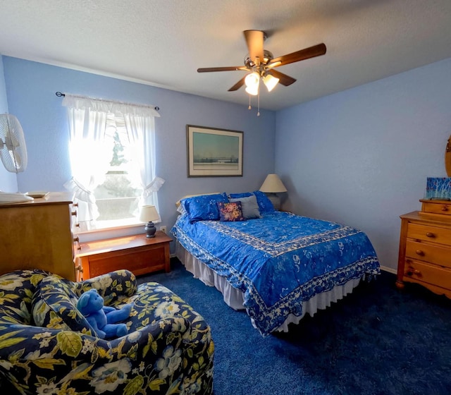 35881 Warbler Dr, Ronan, MT 59864 - bedroom with carpet flooring and ceiling fan