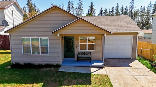 35881 Warbler Dr, Ronan, MT 59864 - view of front of property featuring concrete driveway and an attached garage