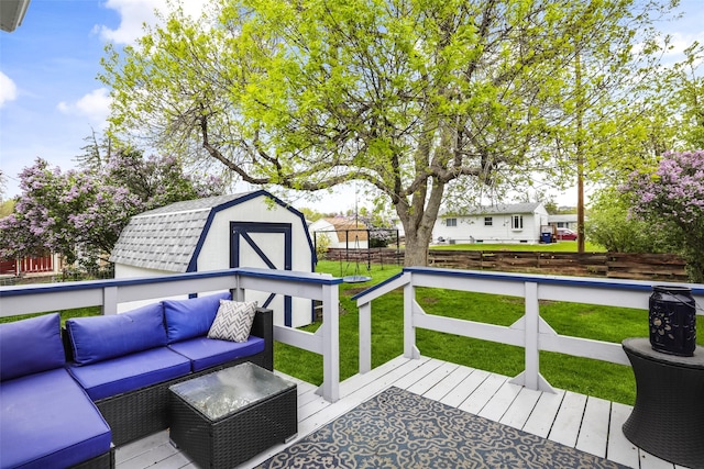 501 23rd Ave NE, Great Falls, MT 59404 - deck with outdoor lounge area, a shed, and an outdoor structure