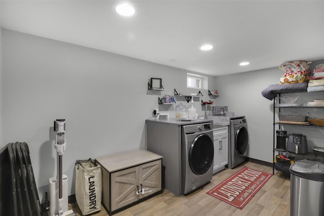 501 23rd Ave NE, Great Falls, MT 59404 - laundry room featuring light wood-type flooring, washer / dryer, and recessed lighting