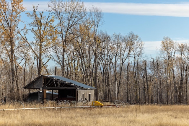 3690 Big Flat Rd, Missoula, MT 59804 - view of outbuilding featuring an outbuilding and a view of trees