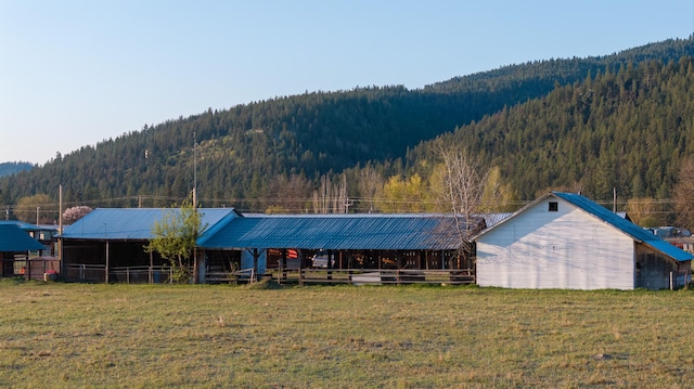 3690 Big Flat Rd, Missoula, MT 59804 - horse barn with a forest view and a mountain view