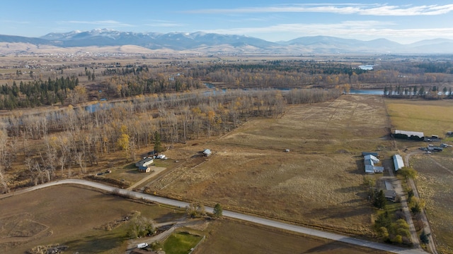 3690 Big Flat Rd, Missoula, MT 59804 - aerial view of property and surrounding area with a mountain backdrop and rural landscape