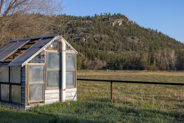 3690 Big Flat Rd, Missoula, MT 59804 - view of greenhouse with a mountain view and a forest view
