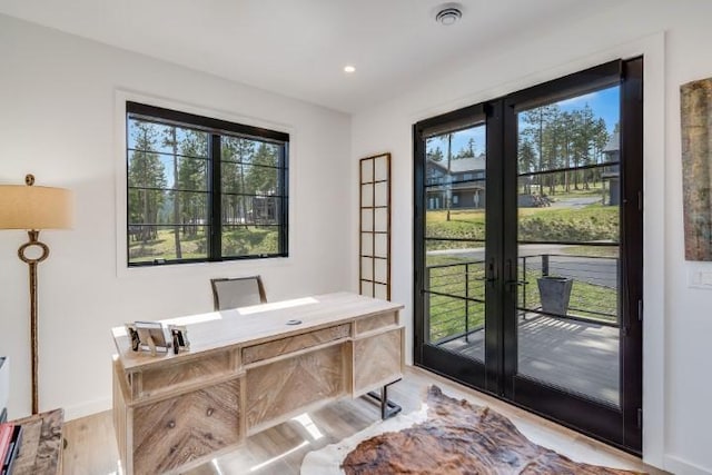 111 Blacktail Loop, Lakeside, MT 59922 - office featuring healthy amount of natural light, light wood finished floors, french doors, and recessed lighting