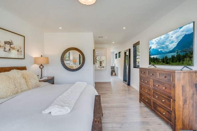 111 Blacktail Loop, Lakeside, MT 59922 - bedroom featuring light wood finished floors and recessed lighting