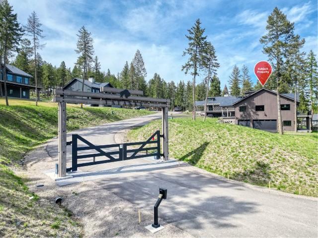 111 Blacktail Loop, Lakeside, MT 59922 - gate with a lawn
