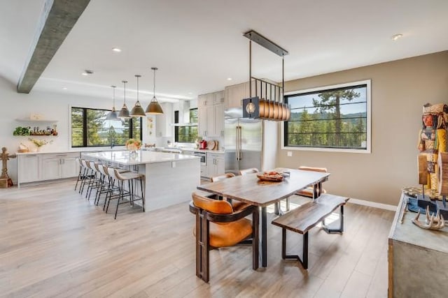 111 Blacktail Loop, Lakeside, MT 59922 - dining room featuring light wood-style flooring and recessed lighting