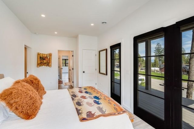 111 Blacktail Loop, Lakeside, MT 59922 - bedroom with access to exterior and recessed lighting
