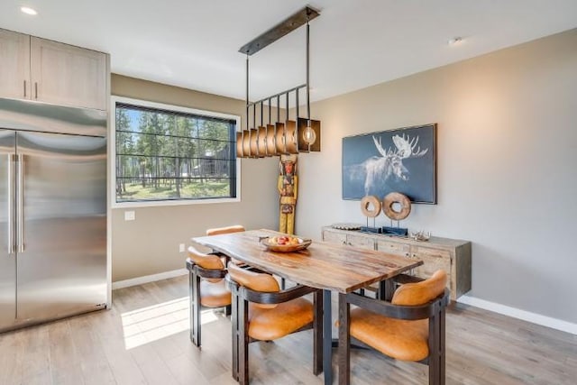 111 Blacktail Loop, Lakeside, MT 59922 - dining room featuring light wood-type flooring and recessed lighting