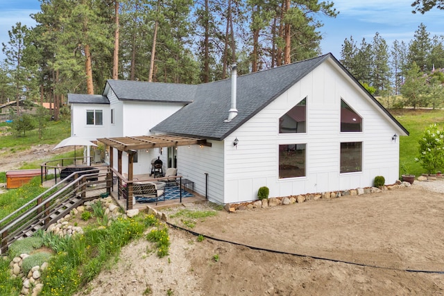 440 E 20th St, Hamilton, MT 59840 - view of front of home featuring roof with shingles, a patio, and a pergola