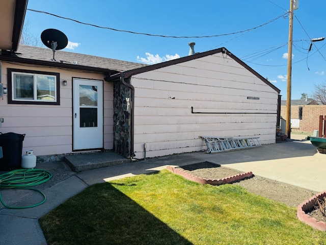 901 Birch Ave, Shelby, MT 59474 - rear view of house featuring a patio area and a lawn