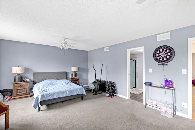 1200 32nd St S Unit 6, Great Falls, MT 59405 - bedroom featuring carpet flooring, a textured ceiling, a ceiling fan, and baseboards