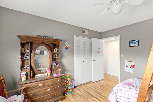 1200 32nd St S Unit 6, Great Falls, MT 59405 - bedroom with light wood-type flooring, a closet, and ceiling fan