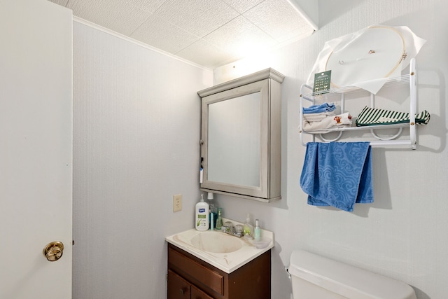 1200 32nd St S Unit 6, Great Falls, MT 59405 - bathroom featuring toilet, vanity, and crown molding