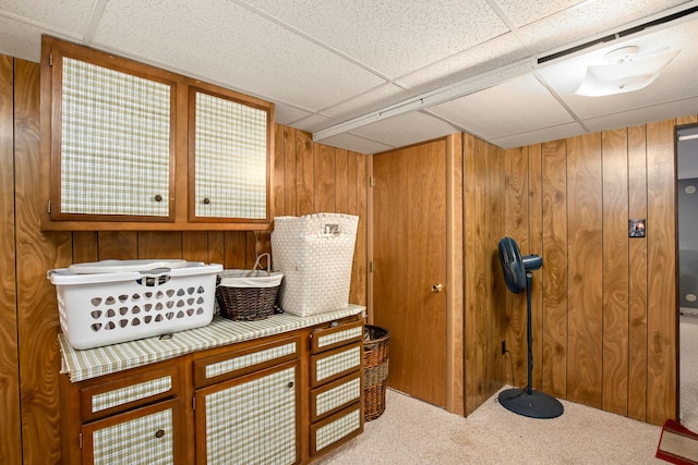 1200 32nd St S Unit 6, Great Falls, MT 59405 - interior space featuring a paneled ceiling, carpet flooring, and wood walls