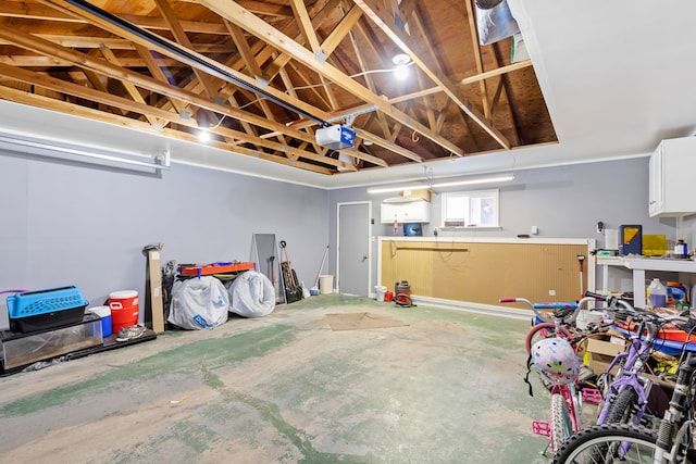 1200 32nd St S Unit 6, Great Falls, MT 59405 - garage featuring a garage door opener