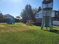 1200 32nd St S Unit 6, Great Falls, MT 59405 - view of green lawn