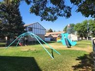 1200 32nd St S Unit 6, Great Falls, MT 59405 - view of play area with a dog friendly area