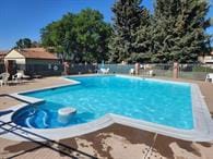 1200 32nd St S Unit 6, Great Falls, MT 59405 - community pool with a patio and a jacuzzi