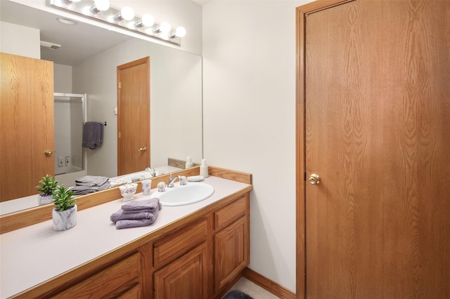full bath featuring a shower, vanity, and a tub to relax in