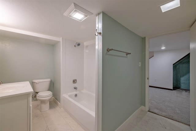 bathroom with marble finish flooring, baseboards, toilet, vanity, and washtub / shower combination