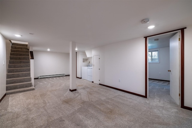 basement featuring baseboard heating, washer and clothes dryer, carpet, recessed lighting, and stairway