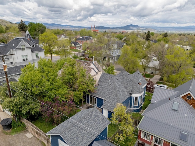 aerial perspective of suburban area featuring a mountainous background