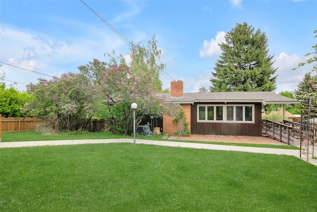 view of front of property featuring a wooden deck and a chimney