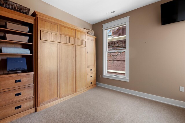 432 W Spruce St Unit 202, Missoula, MT 59802 - unfurnished bedroom featuring light colored carpet and baseboards