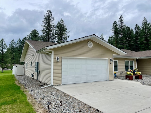 998 Mount Silcox Dr, Thompson Falls, MT 59873 - ranch-style home featuring an attached garage and driveway