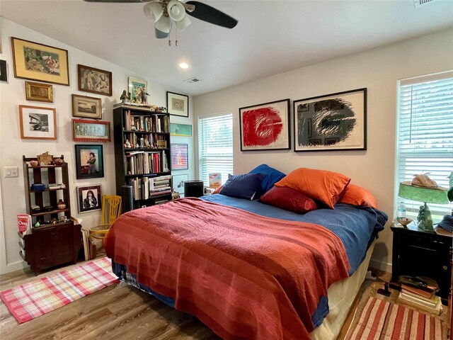 998 Mount Silcox Dr, Thompson Falls, MT 59873 - bedroom with wood finished floors and ceiling fan