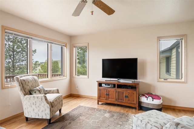 5190 Goodan Ln, Missoula, MT 59808 - living area with healthy amount of natural light, baseboards, and ceiling fan