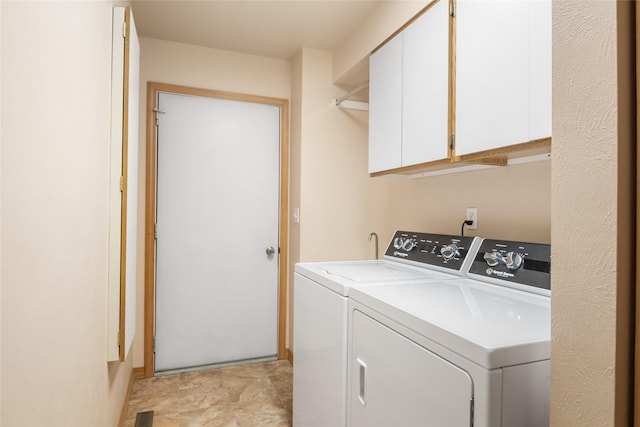 5190 Goodan Ln, Missoula, MT 59808 - laundry area featuring separate washer and dryer and cabinet space