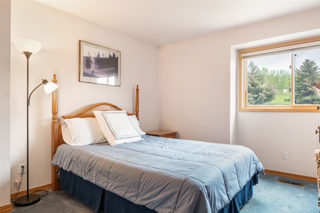5190 Goodan Ln, Missoula, MT 59808 - carpeted bedroom featuring baseboards