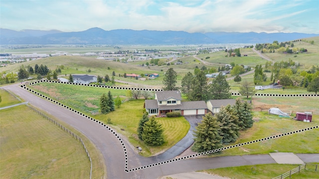 5190 Goodan Ln, Missoula, MT 59808 - aerial view of sparsely populated area with a mountain backdrop and agricultural land