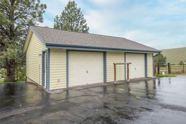 5190 Goodan Ln, Missoula, MT 59808 - detached garage featuring fence