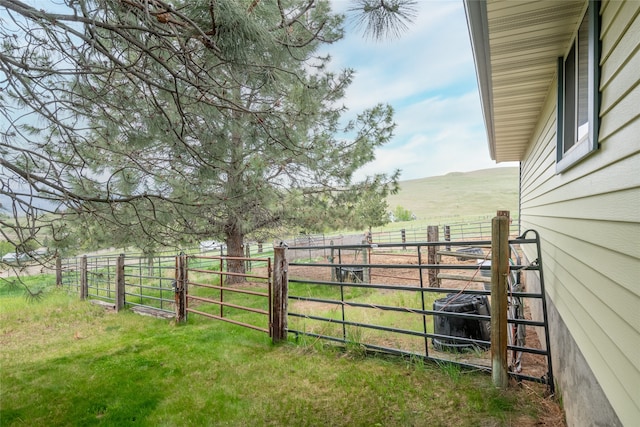 5190 Goodan Ln, Missoula, MT 59808 - view of yard featuring a rural view and an exterior structure