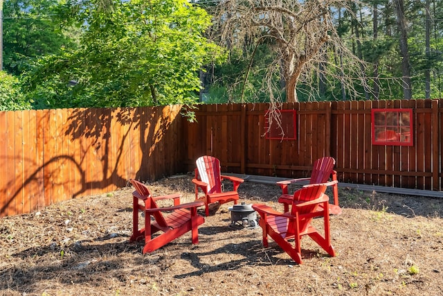 15222 Mt Highway 35, Bigfork, MT 59911 - view of yard featuring a fire pit and fence