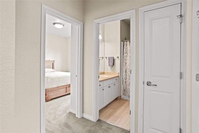 2719 Carnoustie Way, Missoula, MT 59808 - ensuite bathroom featuring vanity and baseboards