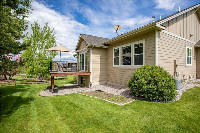 2719 Carnoustie Way, Missoula, MT 59808 - view of side of property featuring a deck and board and batten siding