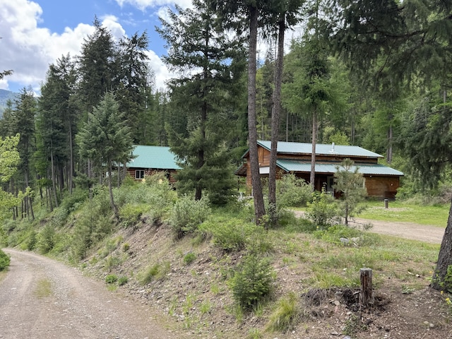 2041 Petty Creek Rd, Alberton, MT 59820 - view of dirt / gravel road featuring a forest view