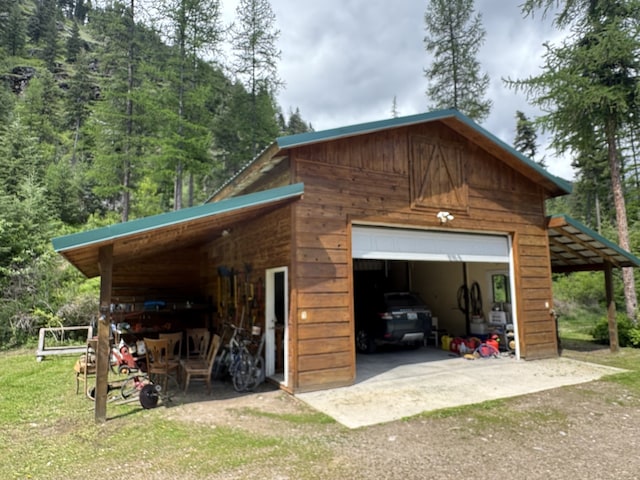 2041 Petty Creek Rd, Alberton, MT 59820 - garage with a garage and dirt driveway