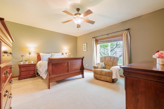 4340 Fox View Loop, Helena, MT 59602 - bedroom with light colored carpet, a ceiling fan, and baseboards