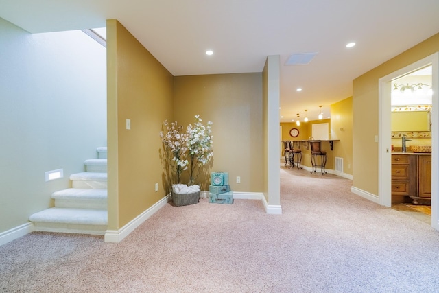 4340 Fox View Loop, Helena, MT 59602 - corridor featuring carpet, stairway, baseboards, recessed lighting, and a sink