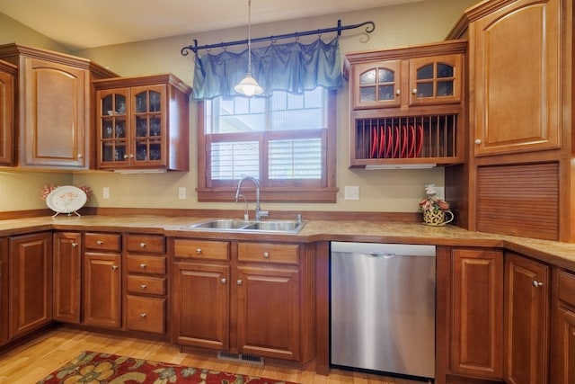 4340 Fox View Loop, Helena, MT 59602 - kitchen featuring dishwasher, a sink, light countertops, and hanging light fixtures