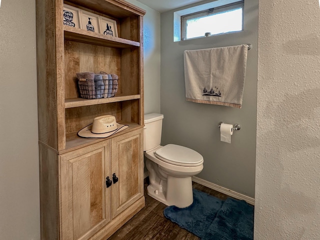 604 27th Ave NE, Great Falls, MT 59404 - bathroom with toilet and wood finished floors